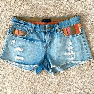 Distressed denim shorts